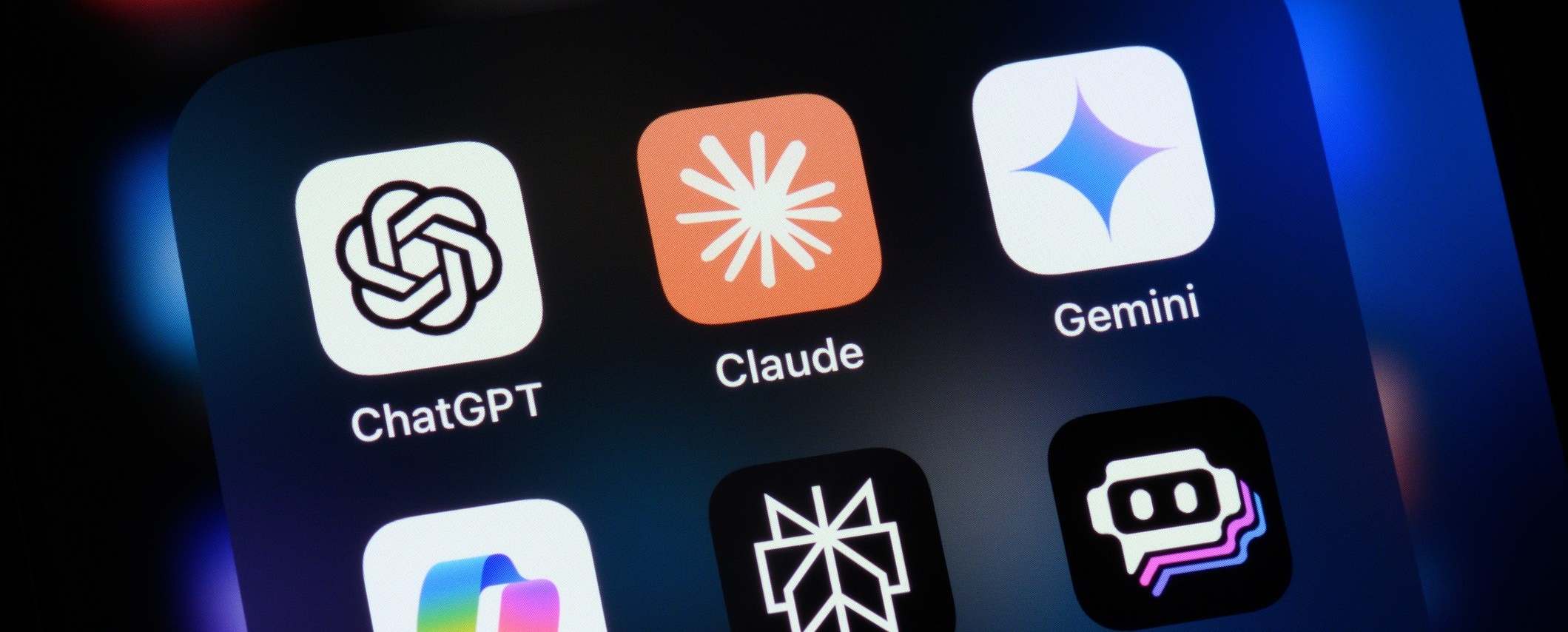 Popular AI assistant apps — Claude, ChatGPT, Gemini, Copilot — on a phone